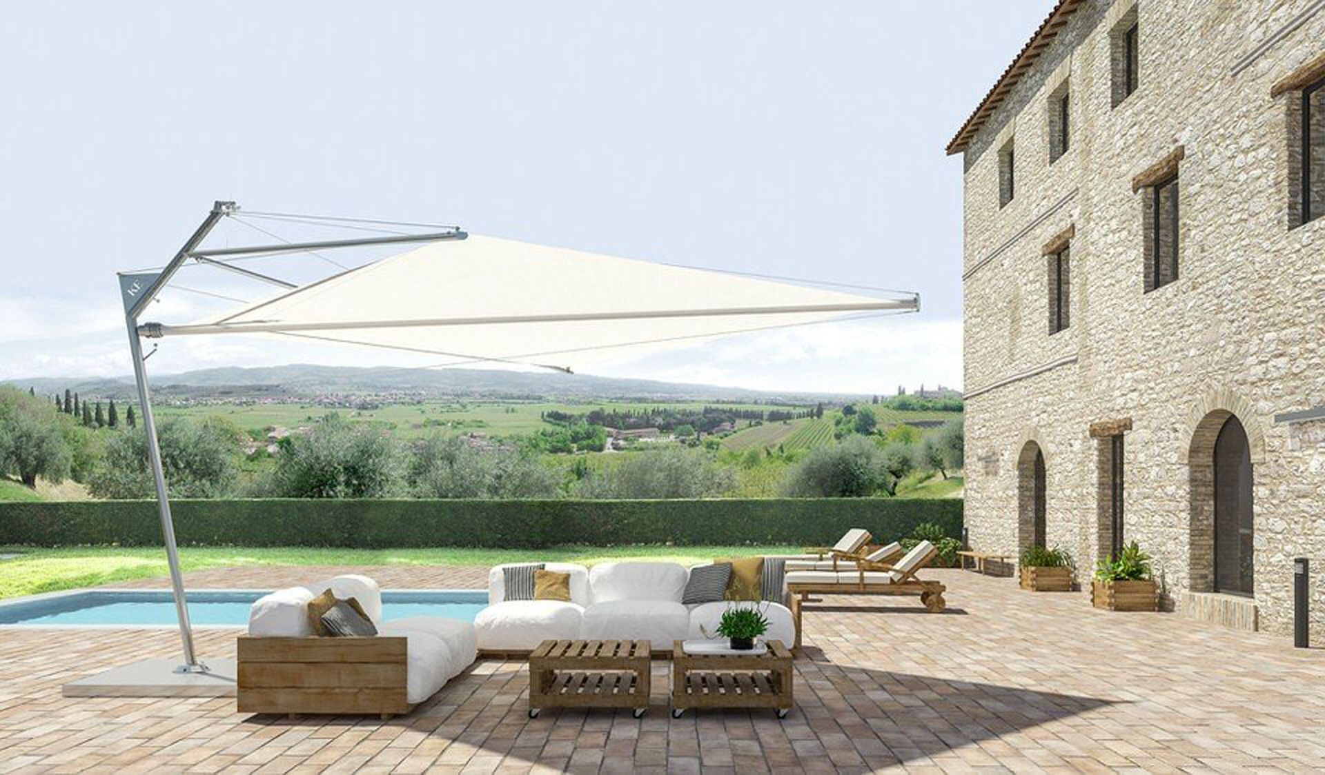 Patio con mobili da esterno, piscina, grande ombrellone e edificio in pietra.