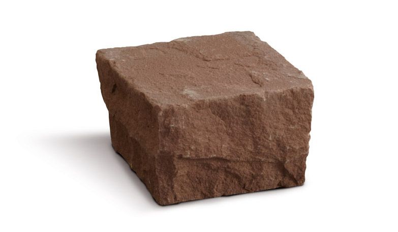 Cubo di arenaria rossa, consistenza ruvida.