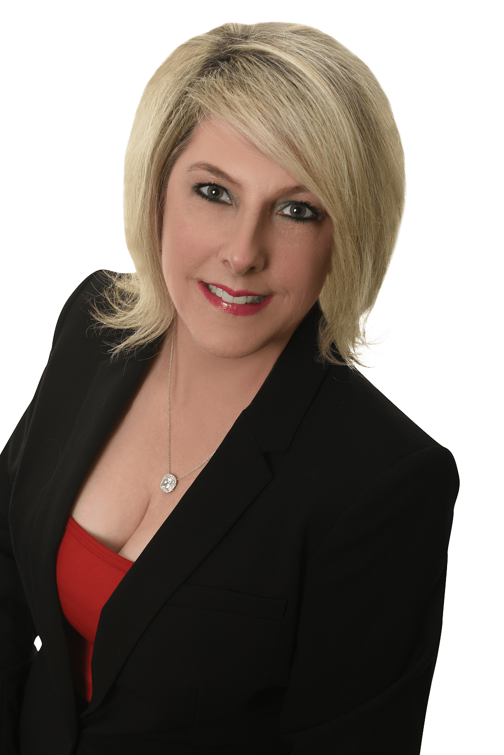 Smiling person in a black blazer over a red top, posed against a white background.