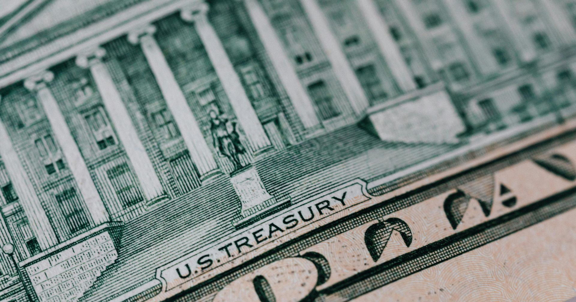Close-up of a U.S. Treasury bill with green engraving and visible lettering