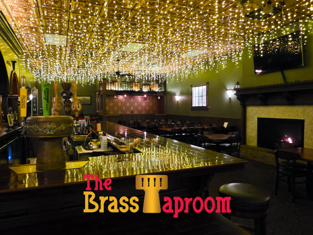 Click to go to The Brass Taproom The Brass Taproom interior. Bar with stools, tables and chairs, decorative ceiling.