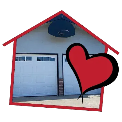 A picture of a house with a red heart in front of it