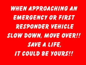 A red sign that says when approaching an emergency or first responder vehicle slow down move over save a life it could be yours