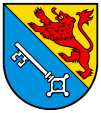 Schild mit diagonalem blau-goldenem Streifen; darüber ein roter Löwe, darunter ein weißer Schlüssel.