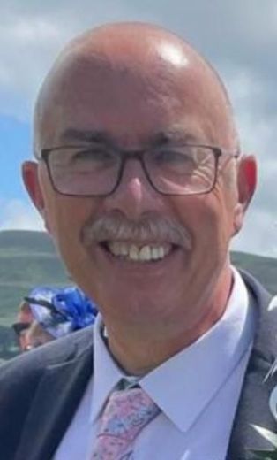 Ian Crisop smiling for the camera.