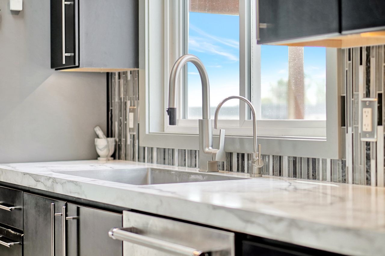 Sink With White Counter Top - Lincoln, NE - Skylimit Remodeling