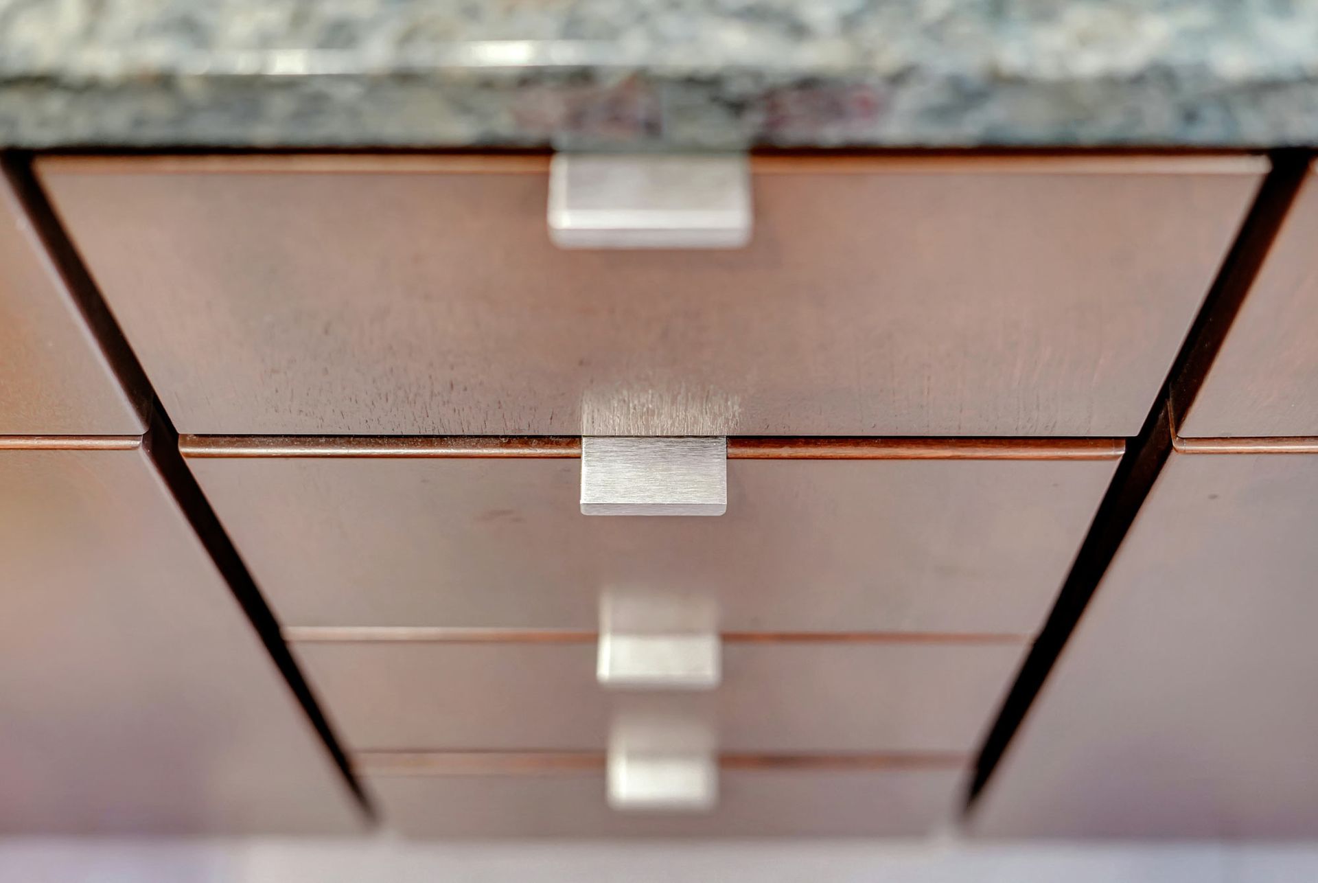 Close Up Of A Kitchen Cabinet With Drawers And A Granite Counter Top | Lincoln, NE | SkyLimit Remodeling