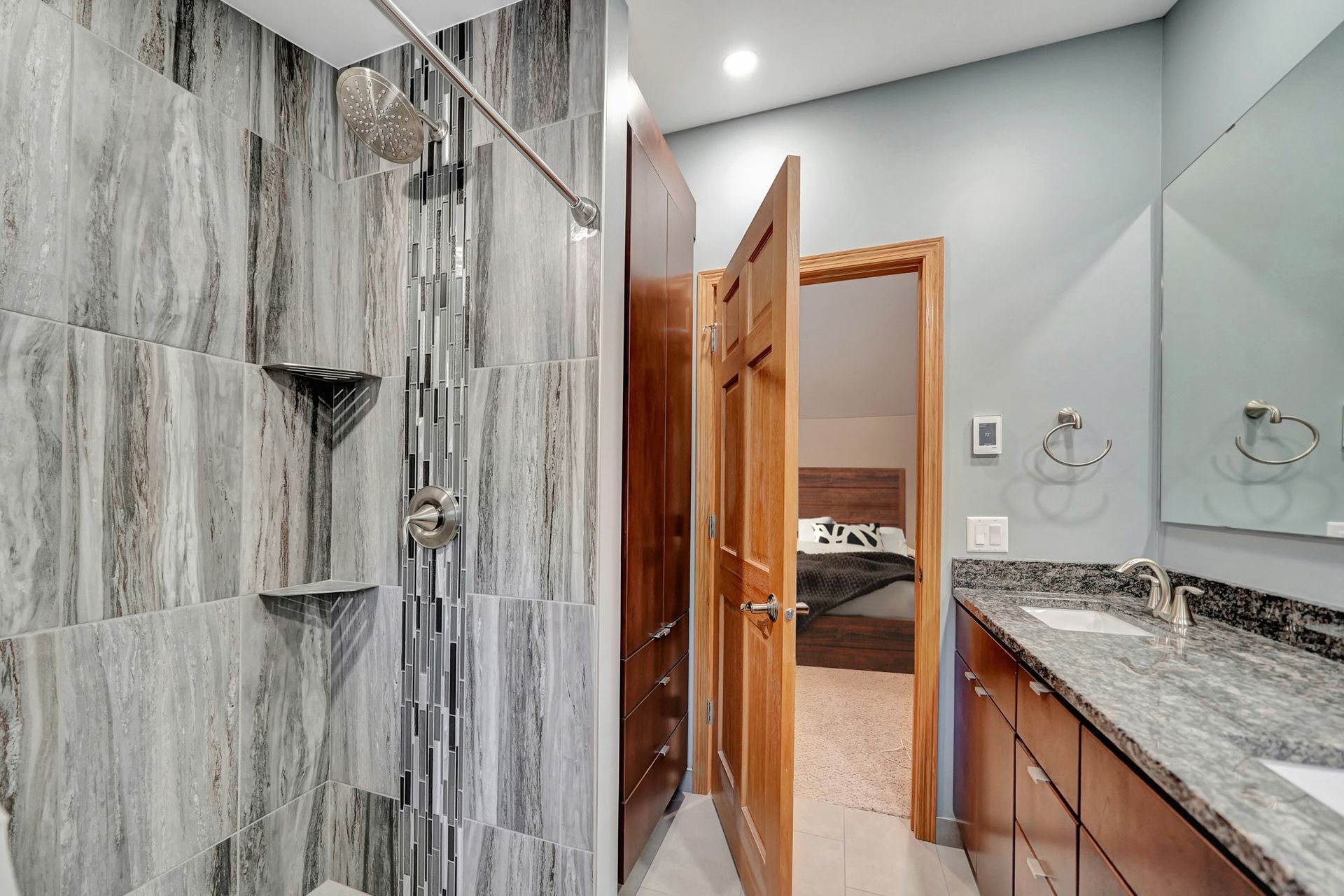 Bathroom With A Walk In Shower , Sink And Mirror | Lincoln, NE | SkyLimit Remodeling
