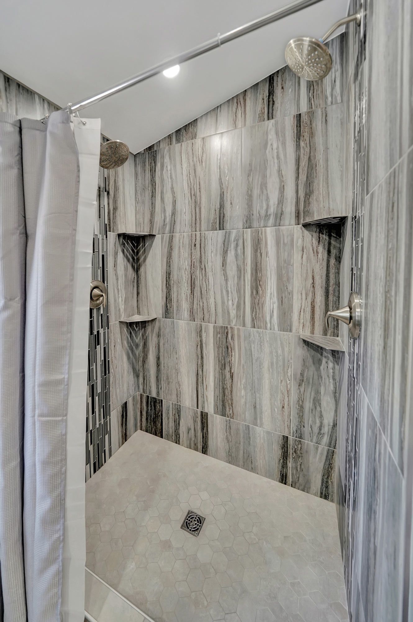 Bathroom with a Walk in Shower and Two Shower Heads | Lincoln, NE | SkyLimit Remodeling