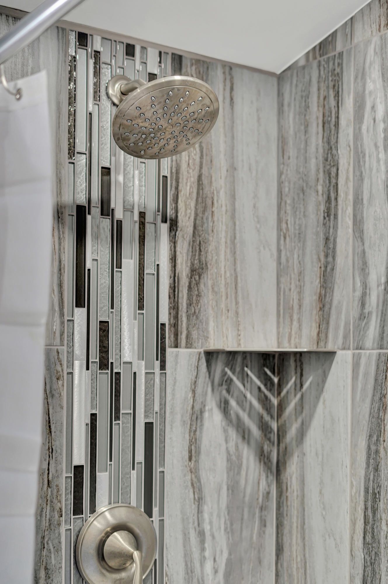 Shower With Two Shower Heads And A Tiled Wall | Lincoln, Ne | Skylimit Remodeling
