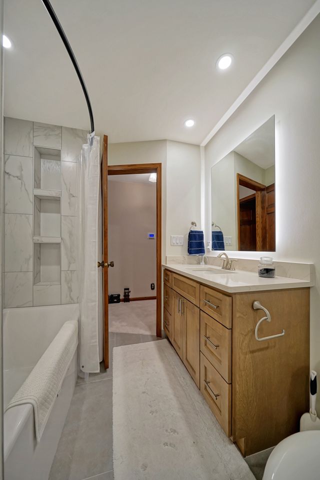Cabinet in Bathroom with Wide Angle Mirror - Lincoln, NE - SkyLimit Remodeling