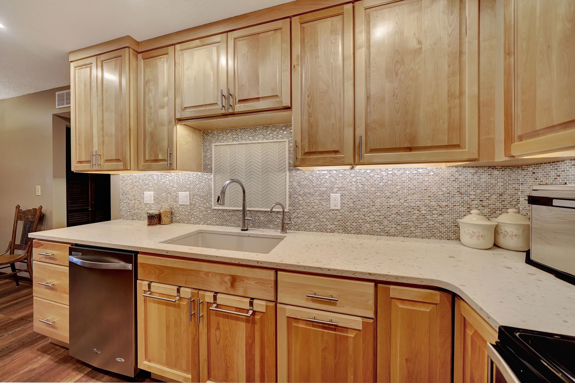 A Kitchen with Wooden Cabinets , Stainless Steel Appliances | Lincoln, NE | SkyLimit Remodeling