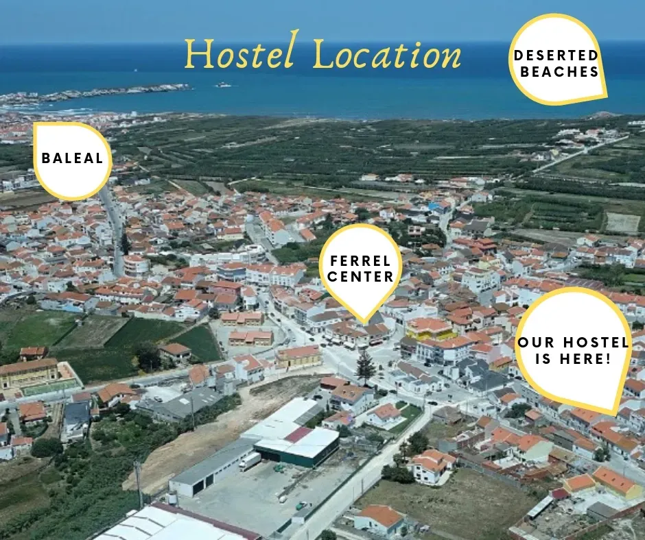 An aerial view of a city shows the hostel location