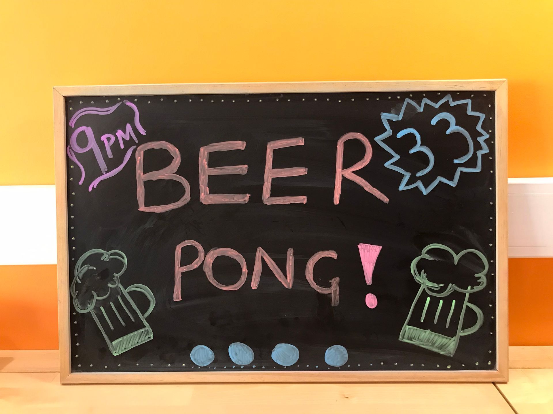 A blackboard with the words beer pong written on it