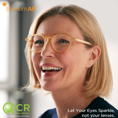 Woman With Short Blond Hair Wearing Orange Glasses
