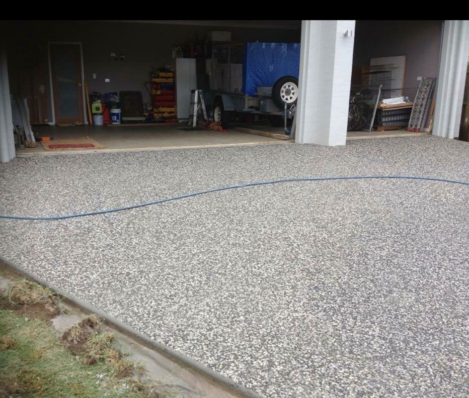 Stylish Concrete Driveway Enhances the Home's Aesthetic Appeal — Bampak In Coolum Beach QLD