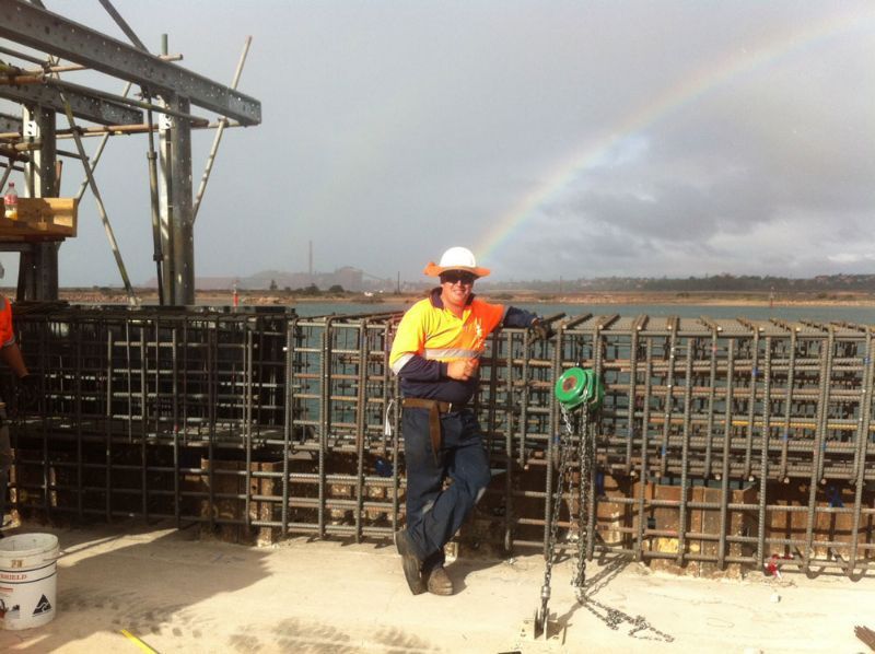 Skilled Workers Against a Colourful Construction Site Backdrop — Bampak In Coolum Beach QLD