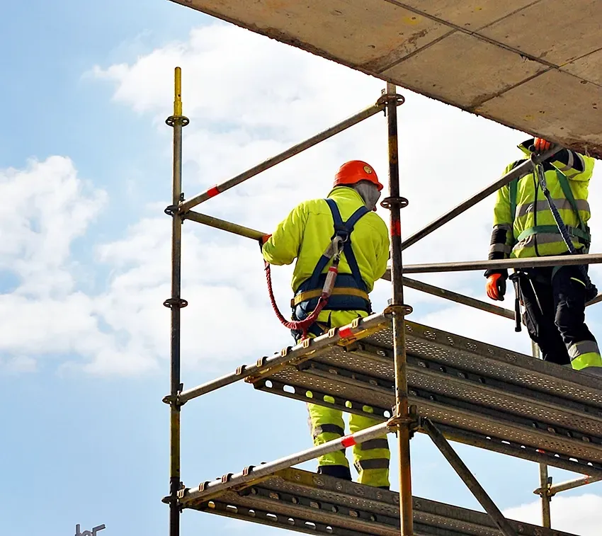 Two Construction Workers on Steel Scaffolding — Bampak In Coolum Beach QLD