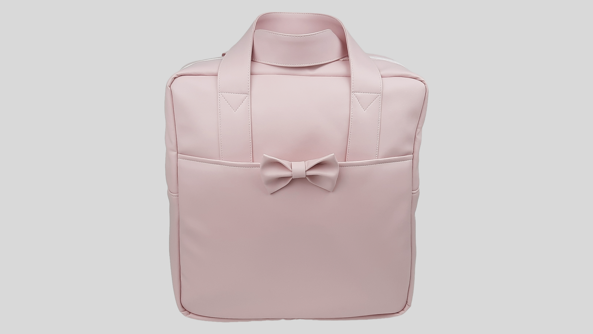 MOCHILA PELE SINTÉTICA LISA COR ROSA COM BOLSO EXTERIOR, FECHO DE CORRER, ALÇAS TRASEIRAS AJUSTÁVEIS E LAÇO