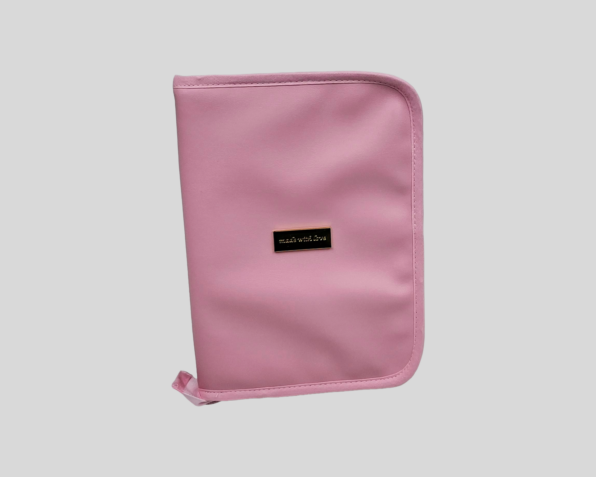 PORTA DOCUMENTOS PELE SINTÉTICA LISA COR ROSA COM FECHO DE CORRER, CHAPA DOURADA.