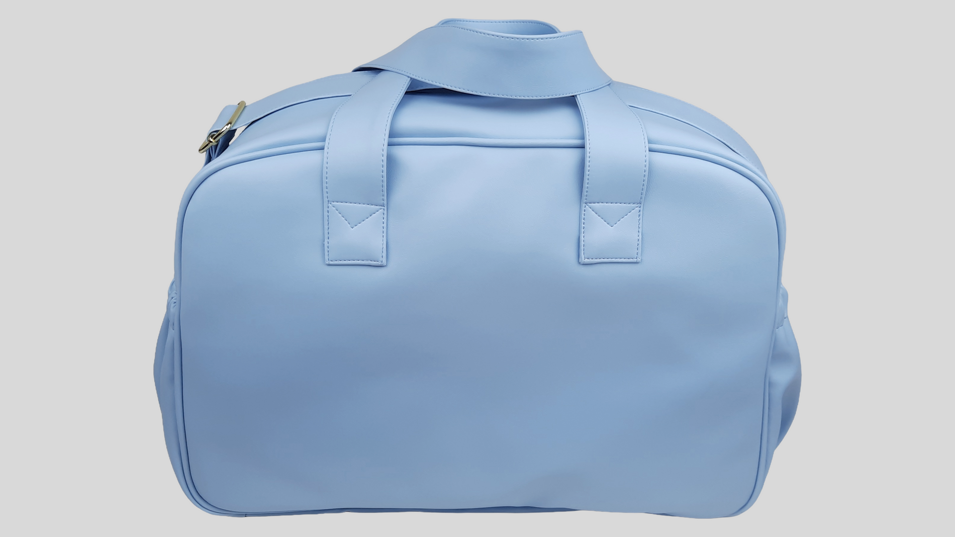 SACO MATERNIDADE PELE SINTÉTICA LISA COR AZUL COM BOLSOS EXTERIORES À FRENTE E DOS LADOS, FECHO DE CORRER, ALÇA DE OMBRO AJUSTÁVEL, ACESSÓRIOS DOURADOS