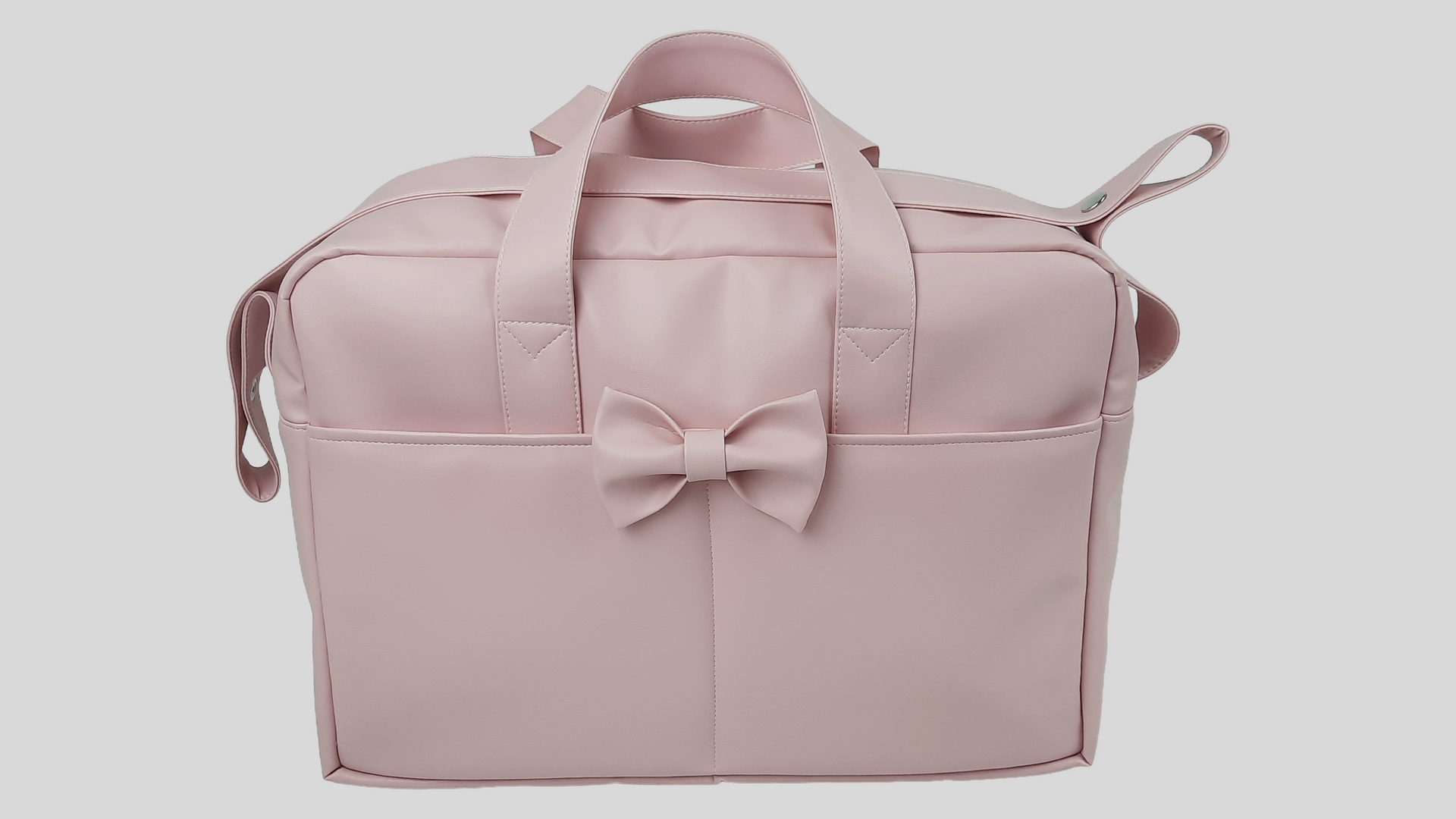 SACO MATERNIDADE PELE SINTÉTICA  LISA COR ROSA COM BOLSOS, FECHO DE CORRER, ALÇA DE OMBRO AJUSTÁVEL E LAÇO