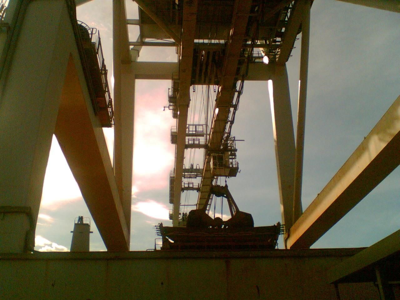 Looking Up At A Crane With A Cloudy Sky In The Background — Canary North Pty Ltd In Annandale, QLD