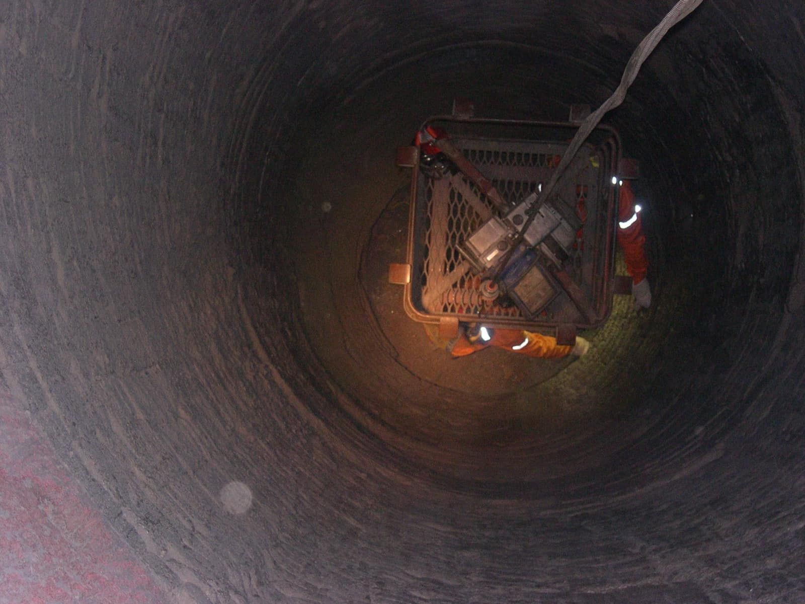 A Group Of People Are Standing In The Middle Of A Tunnel — Canary North Pty Ltd In Annandale, QLD