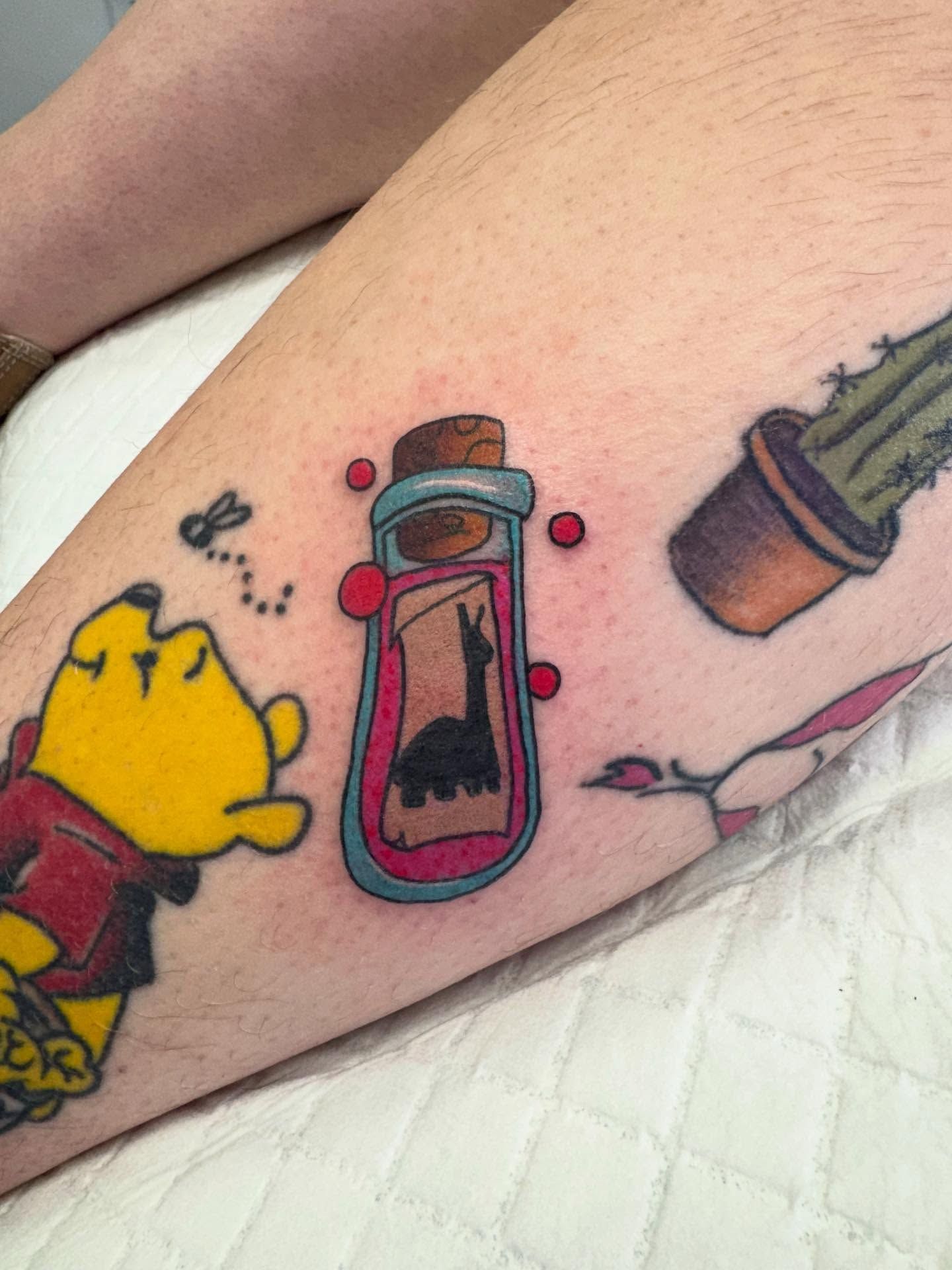kuzco's poison tattoo | the poison to kill kuzco | kusco tattoo | tattoos by rachel | body art by rachel | portland, OR | Wilsonville, OR