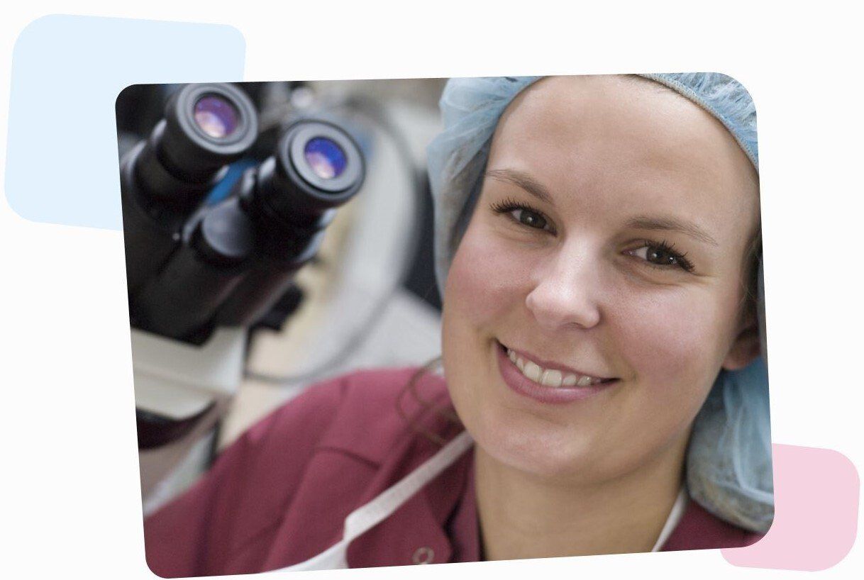 smiling female doctor with a hospital bag on her hair and a big microscope in the background