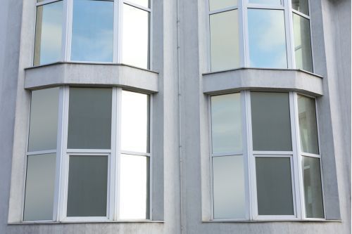 Person Installing Window Tint At Home