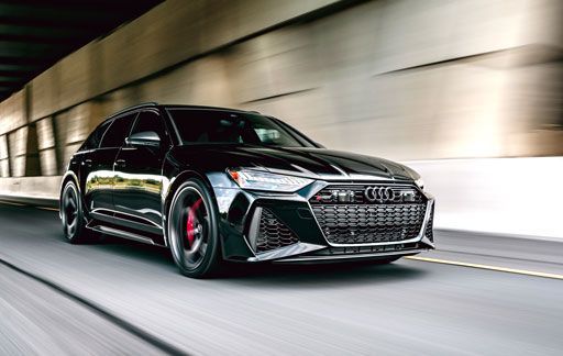 Black Audi RS6 wrapped in LLumar Platinum PPF driving in tunnel