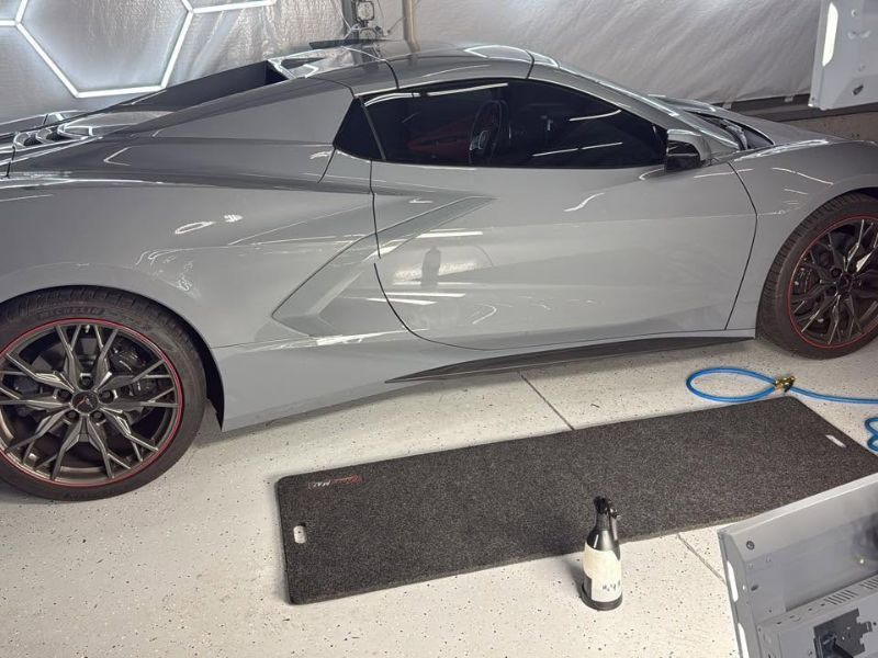 PPF being replaced on 2025 grey corvette rocker after paint was saved from damage