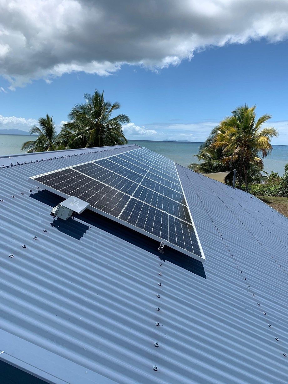 Solar Panels On Roof With View Of Beach — Mission Solar And Electrical In Mission Beach, QLD