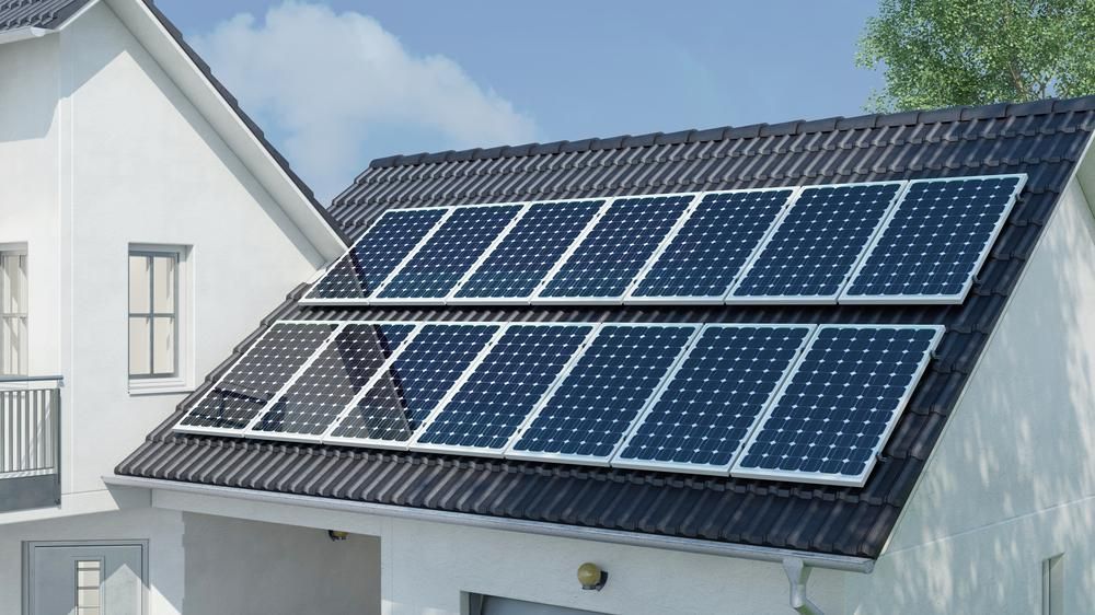 A White House With Solar Panels On The Roof — Mission Solar And Electrical In Mission Beach, QLD