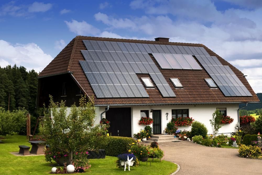 A House With A Lot Of Solar Panels On The Roof — Mission Solar And Electrical In Tully, QLD