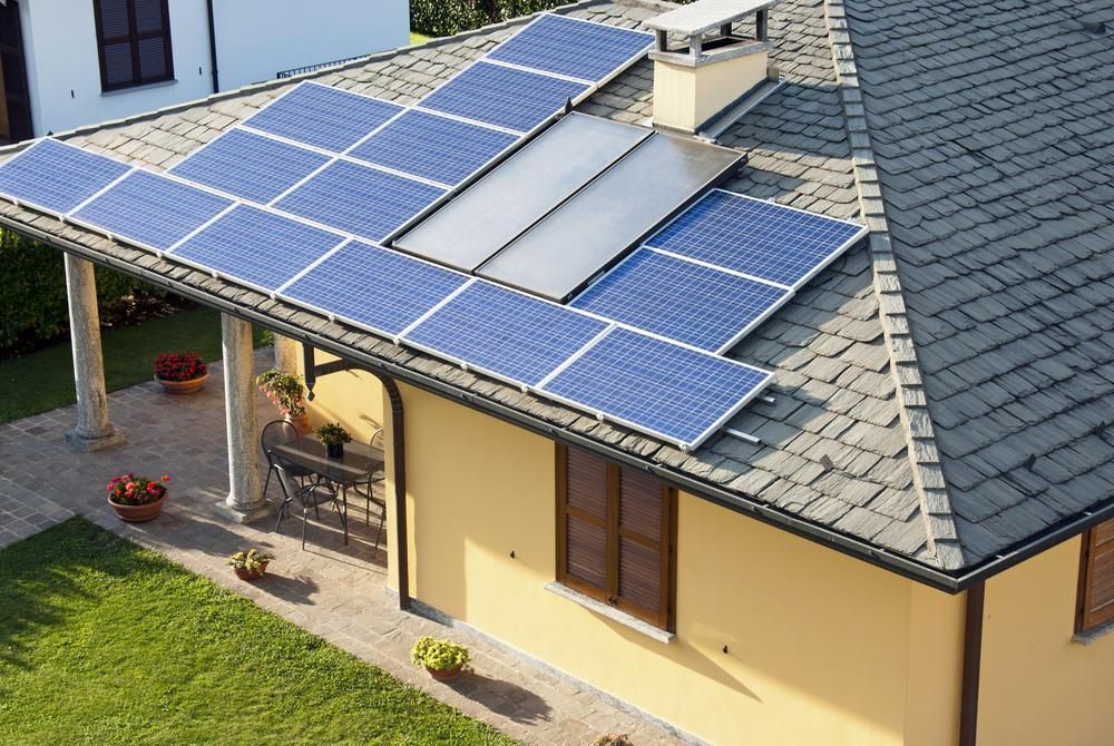 A House With A Lot Of Solar Panels On The Roof — Mission Solar And Electrical In Tully, QLD