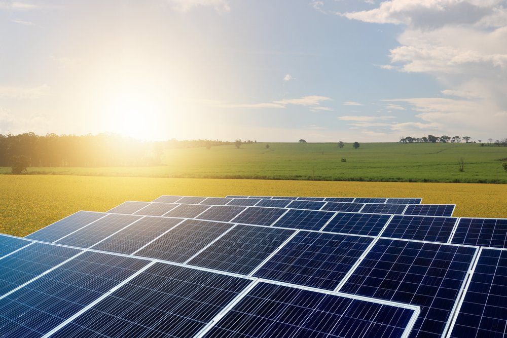 Sunset Over Solar Energy Farm Plant — Mission Solar And Electrical In Mission Beach, QLD