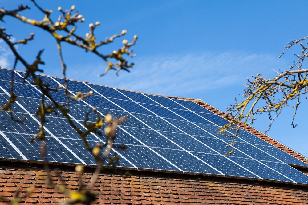 Solar Panels On Brown Roof — Mission Solar And Electrical In Mission Beach, QLD