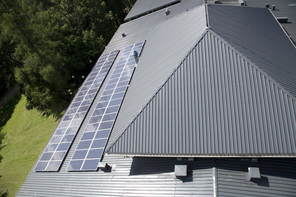Solar Panel On Metal Roof — Mission Solar And Electrical In Mission Beach, QLD