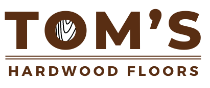 Tom's Hardwood Floors logo