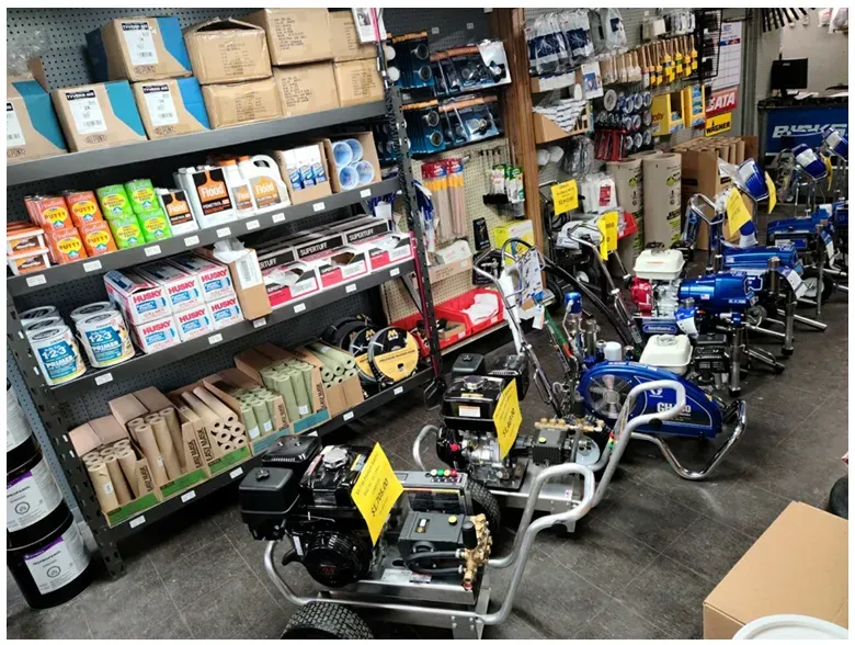 Man Using Spray Paint Gun — Houston, TX — EAH Spray Equipment Man Using Spray Paint Gun — Houston, TX — EAH Spray Equipment