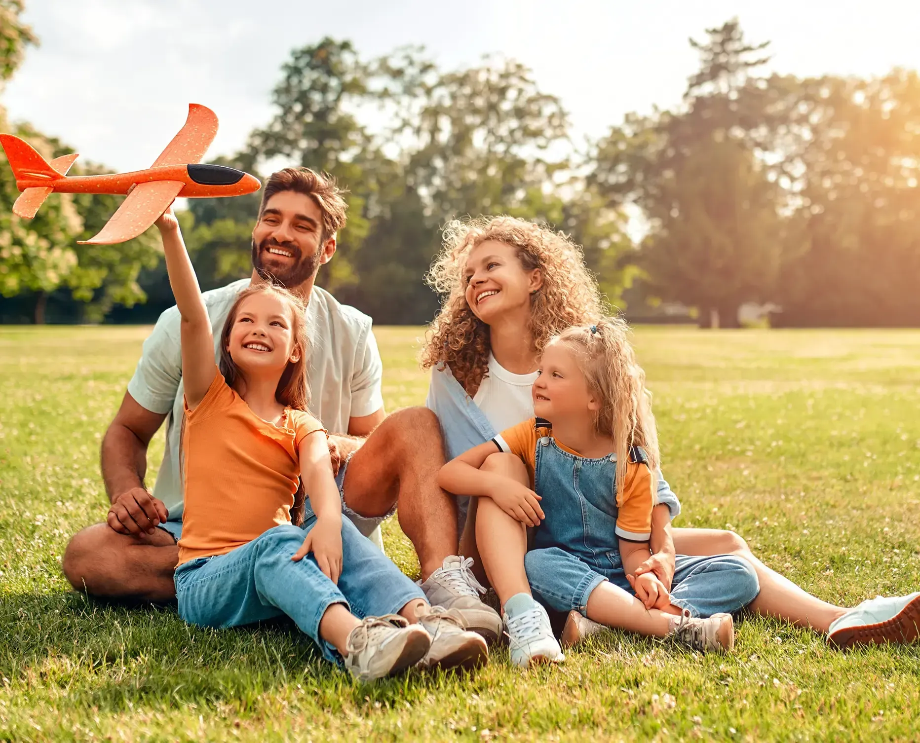 Family of four happily bonding