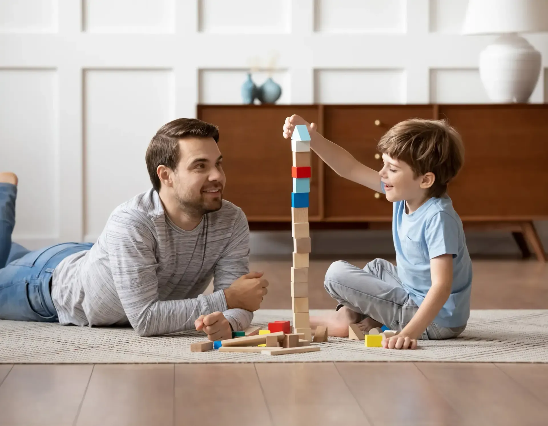 A father playing with his son.
