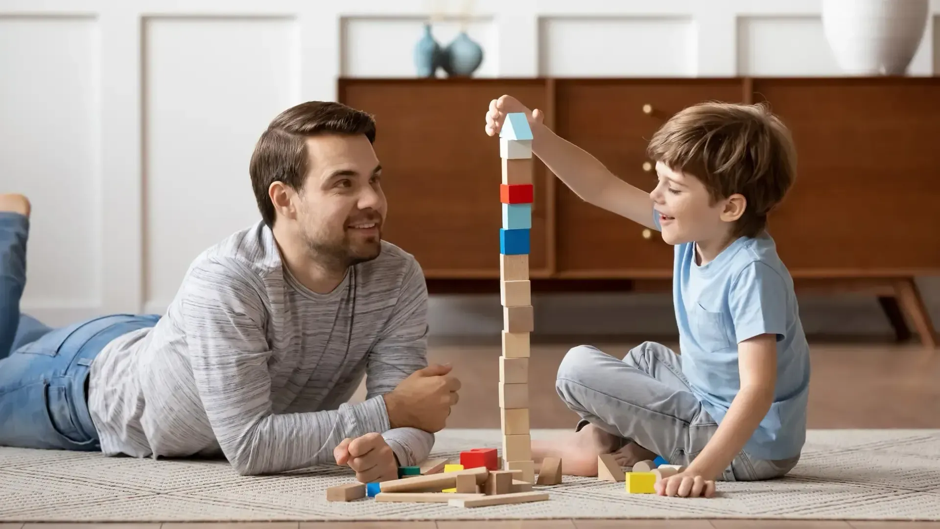 A father playing with his son