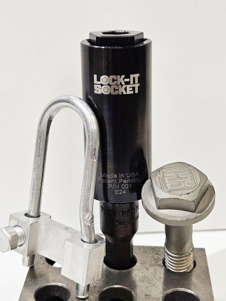 The Lock-It Socket shown with a Penta bolt and one-time lock.