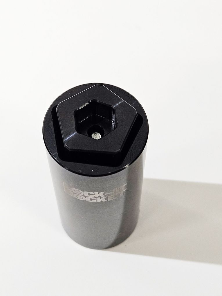 The Lock-it Socket showing the Penta socket, hex fitting, and the ejector pin