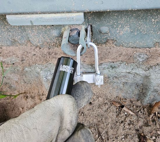 Lock-it socket shown next to one-time lock with break off nut