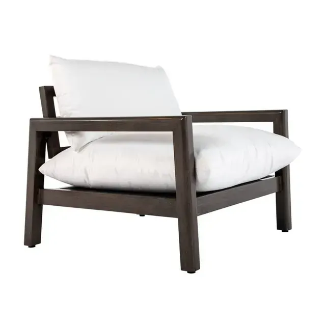 Wooden framed outdoor chair with white cushions.
