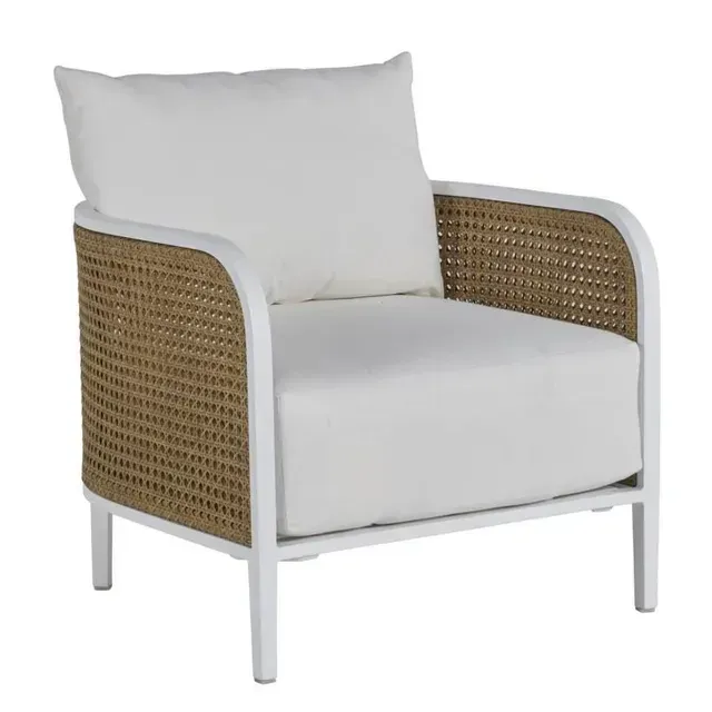 White-cushioned outdoor armchair with woven brown sides and a white frame.